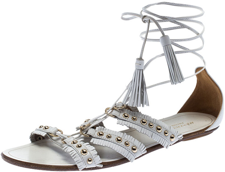 white tassel sandals