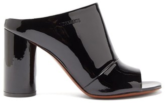 Vetements Logo-debossed Patent-leather Mules - Womens - Black Vetements Logo-debossed Patent-leather Mules - Womens - Black