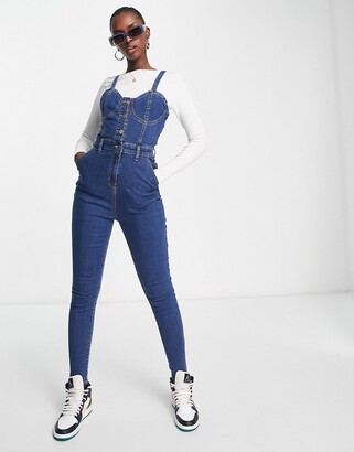 Rebellious Fashion strappy button front denim jumpsuit in mid blue -  ShopStyle