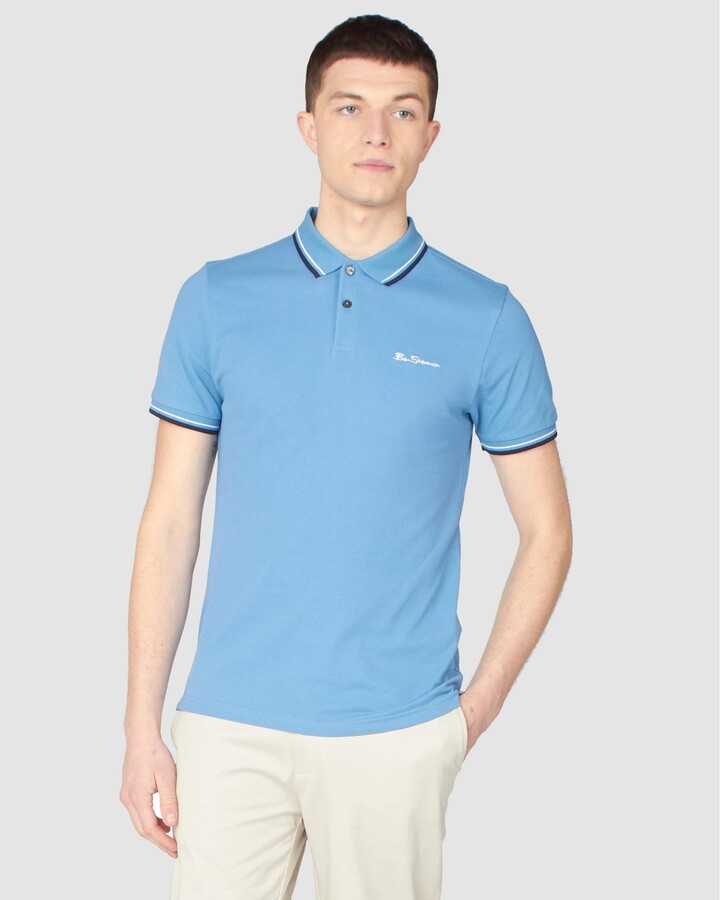 blue polo top
