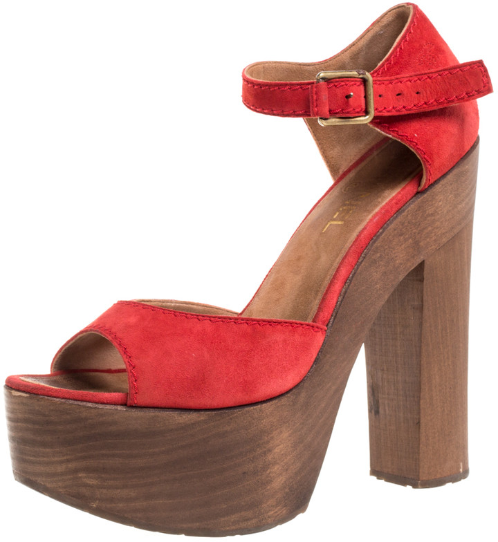 red wooden heels