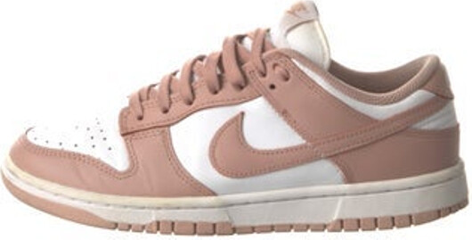 Nike Leather Low Top Athletic Sneakers Pink & White Colorblock Pattern Rubber Trim Round-Toes Lace-Up Closure at Uppers Includes Box Unfortunately, due to restrictions, this item may not be eligible for shipping in all areas.