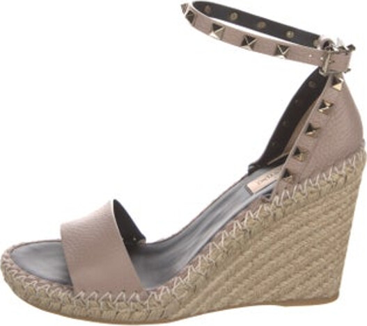 Valentino Leather Espadrilles Neutrals Colorblock Pattern Studded Accents Platform Wrap-Around Straps & Buckle Closure at Ankles Includes Box & Dust Bag Unfortunately due to restrictions this item may not be eligible for shipping in all areas.