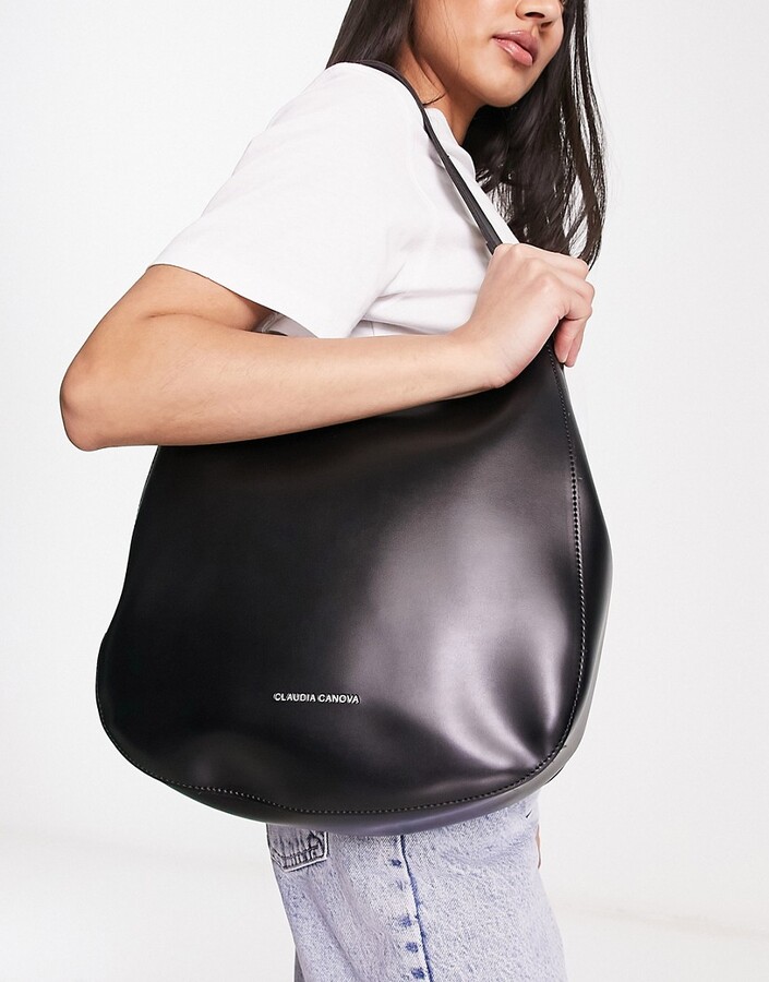Claudia Canova curved shoulder bag with cross body strap in black