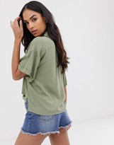 Thumbnail for your product : ASOS DESIGN short sleeve crinkle shirt with tie front