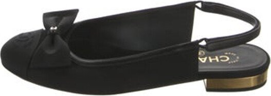 Chanel Leather Slingback Flats From the Summer 2024 Collection by Virginie Viard Black Interlocking CC Logo Grosgrain & Bow Accents Round-Toes Velcro Closure at Ankles Includes Dust Bag Designer