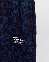 Thumbnail for your product : Topman Signature joggers in navy leopard print