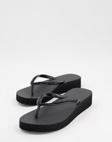 Thumbnail for your product : Accessorize Eva wedge thong flip flops in black