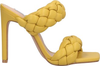 persona que practica jogging Dureza Maestro Steve Madden Women's Yellow Sandals | ShopStyle