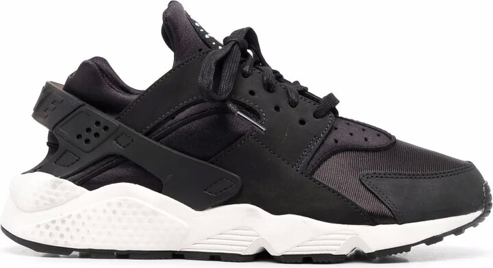 black huaraches with white bottom
