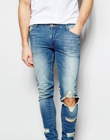 Thumbnail for your product : ASOS Extreme Super Skinny Jeans With Extreme Rips