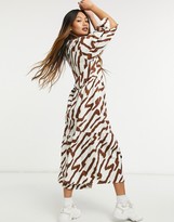 Thumbnail for your product : Glamorous maxi smock dress with tiered skirt and bib collar in tonal tiger print