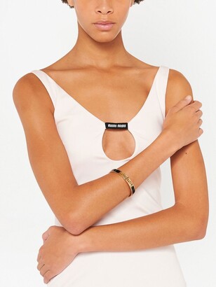 【Miu Miu 】Logo-Engraved Bracelet Miu Miu logo-charm Rope Bracelet | Black | FARFETCH