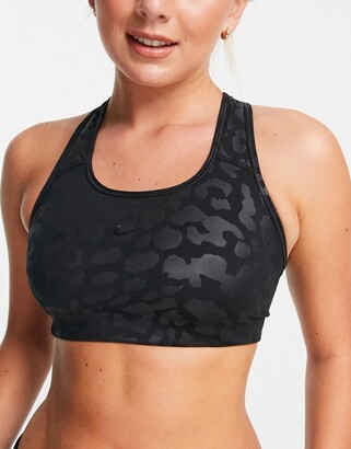 Nike Training Nike Pro Training tonal leopard print medium support sports  bra in black - ShopStyle