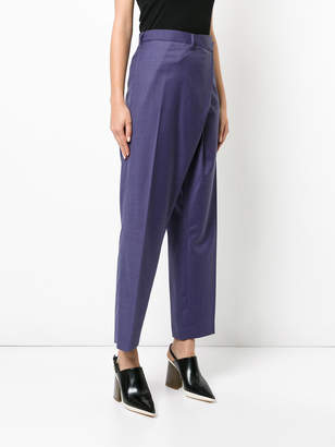 Toga Pulla high-waisted belted trousers