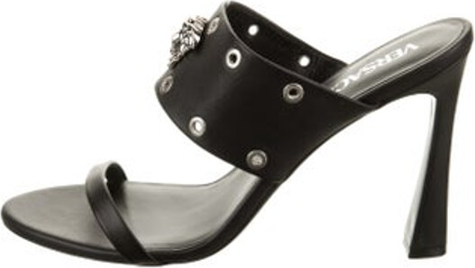 Versace Leather Slides Black Studded Accents Includes Box & Dust Bag Unfortunately, due to restrictions, this item may not be eligible for shipping in all areas.