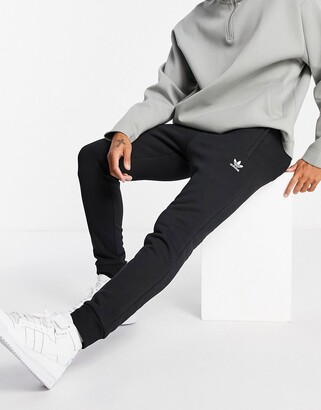 adidas essentials slim fit joggers with small logo in black - ShopStyle  Trousers