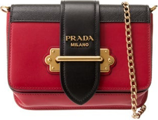 Prada Crossbody Bag Fuoco & Nero City Calf Leather Colorblock Pattern Saffiano Leather Gold-Tone Hardware Saffiano Leather Trim Chain-Link Handle & Chain-Link Shoulder Strap Chain-Link Accents Logo Jacquard Lining & Single Interior Pocket Flap & Pull-Through Closures at Front Includes Dust Bag & Authenticity Card Unfortunately, due to restrictions, this item may not be eligible for shipping in all areas.