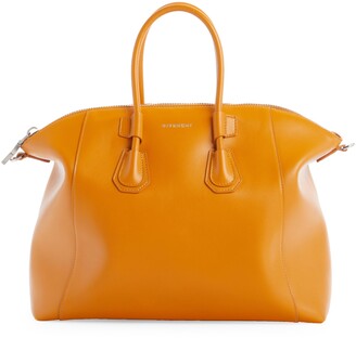 Givenchy Orange Handbags | ShopStyle