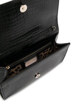 Thumbnail for your product : Philipp Plein Baroque knuckle duster leather clutch bag