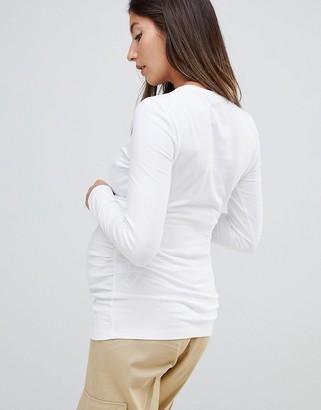 ASOS DESIGN Maternity long sleeve crew neck t-shirt with bump ruching in white