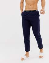 Thumbnail for your product : ASOS Design DESIGN woven straight pyjama bottoms in navy