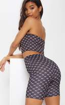 Thumbnail for your product : PrettyLittleThing Black Monogram Print Cycle Short