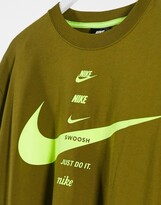 Thumbnail for your product : Nike swoosh boyfriend multi logo T-shirt in khaki green