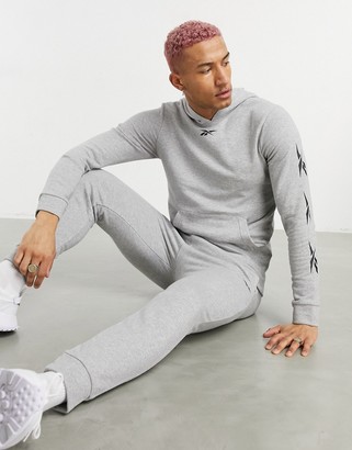 Reebok Training tracksuit with vector sleeve print in grey - ShopStyle  Activewear