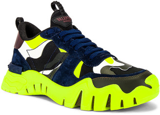 black and lime green sneakers