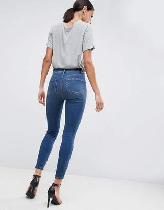 ASOS Design DESIGN Ridley high waist skinny jeans in london blue with western zip front