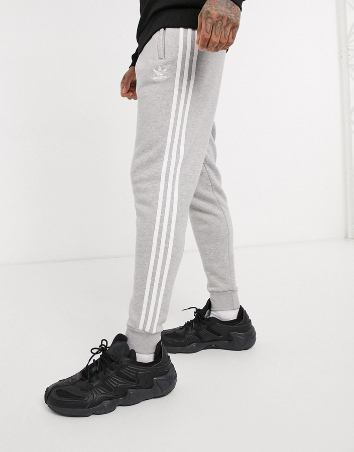 adidas originals adicolor three stripe skinny joggers in grey heather