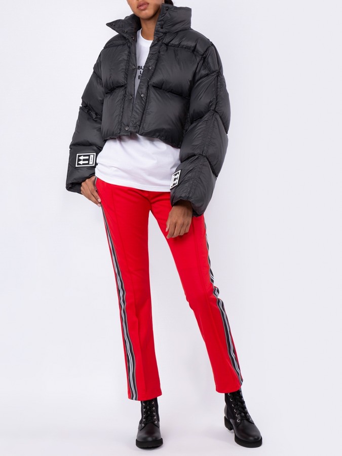 black pants with red stripe down the side