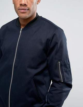 ASOS DESIGN bomber jacket with sleeve zip in navy