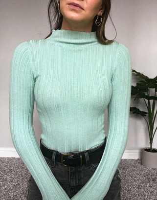 ASOS DESIGN grown-on sleeve sweater with ruffle detail in green