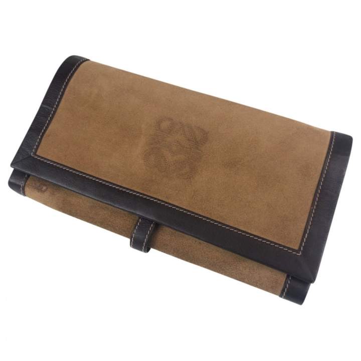 beige suede clutch