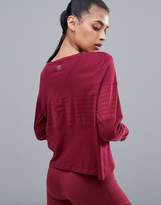 Thumbnail for your product : Reebok Training Mesh Panel Crop Long Sleeve Top In Burgundy