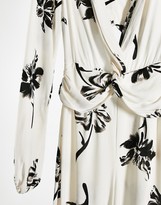 Thumbnail for your product : ASOS Tall ASOS DESIGN tall twist front wide leg jumpsuit in cream floral print
