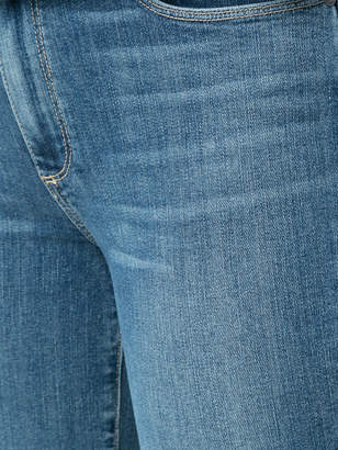 Paige tassel-embellished cropped jeans