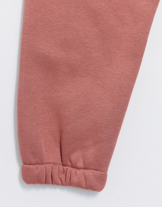 ASOS DESIGN DESIGN tracksuit cropped sweat / oversized jogger in dusty rose