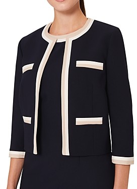 navy blue collarless jacket