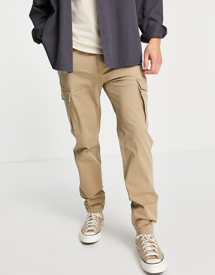 Levi's XX slim tapered cargo pants in beige - ShopStyle Chinos & Khakis
