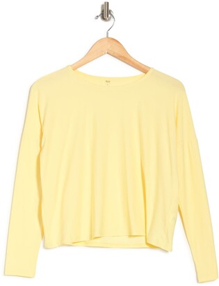 light yellow sweater