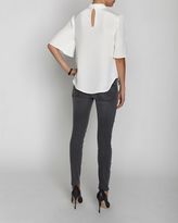 Thumbnail for your product : L'Agence Rolled Neck Flutter Sleeve Blouse