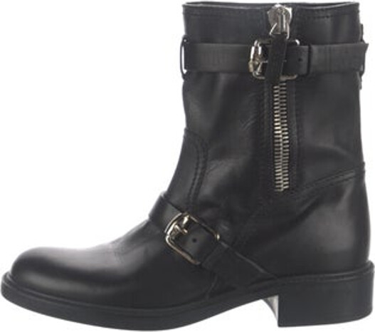 Gucci Leather Ankle Moto Boots Black Round-Toes Wrap-Around Straps & Exposed Zip Closure at Sides Includes Dust Bag Size not listed, estimated from measurements.