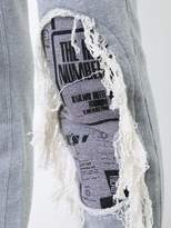 Thumbnail for your product : Miharayasuhiro Maison Mihara Yasuhiro distressed track pants