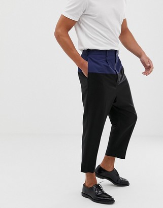 ASOS DESIGN drop crotch tapered smart pant in black wool with techy cut and sew