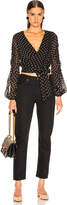 Thumbnail for your product : Nicholas Polka Dot Pintuck Wrap Top in Black | FWRD