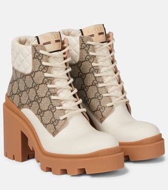 Gucci GG canvas and leather lace-up boots