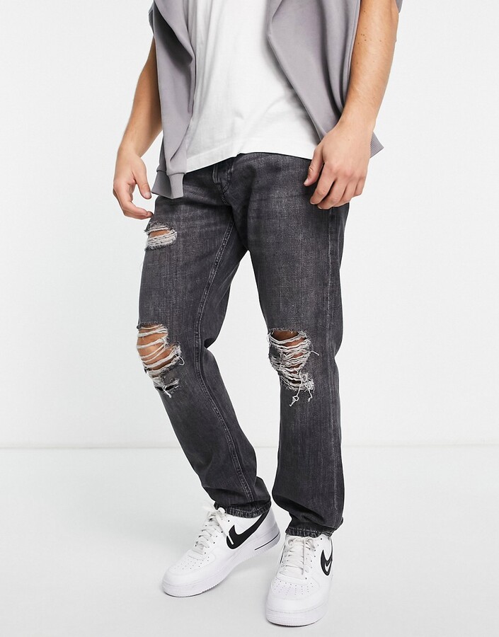 Jack and Jones Chris Loose fit jean with knee rips in black - ShopStyle